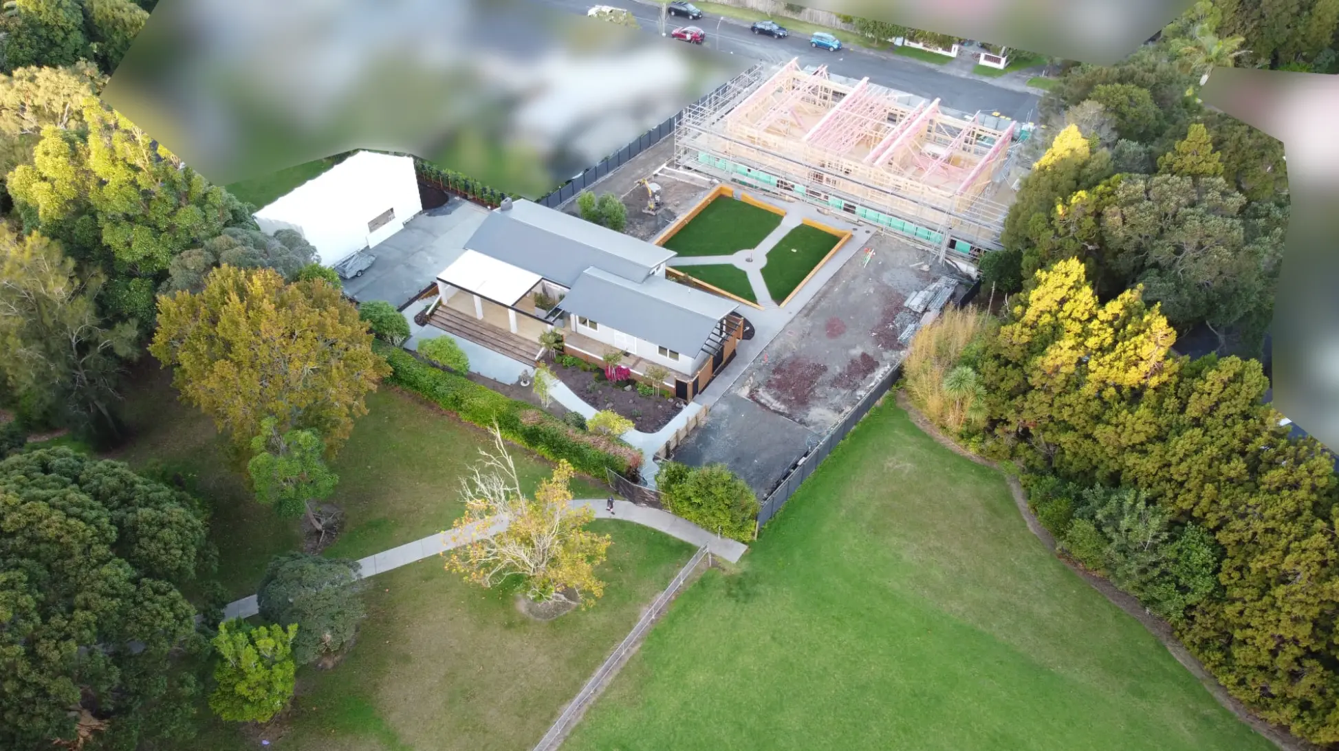 High drone shot of The Academy's main building taken from the front