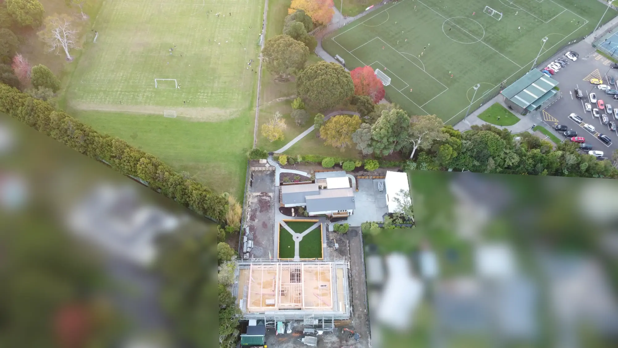 High drone shot of The Academy's main building taken from the front