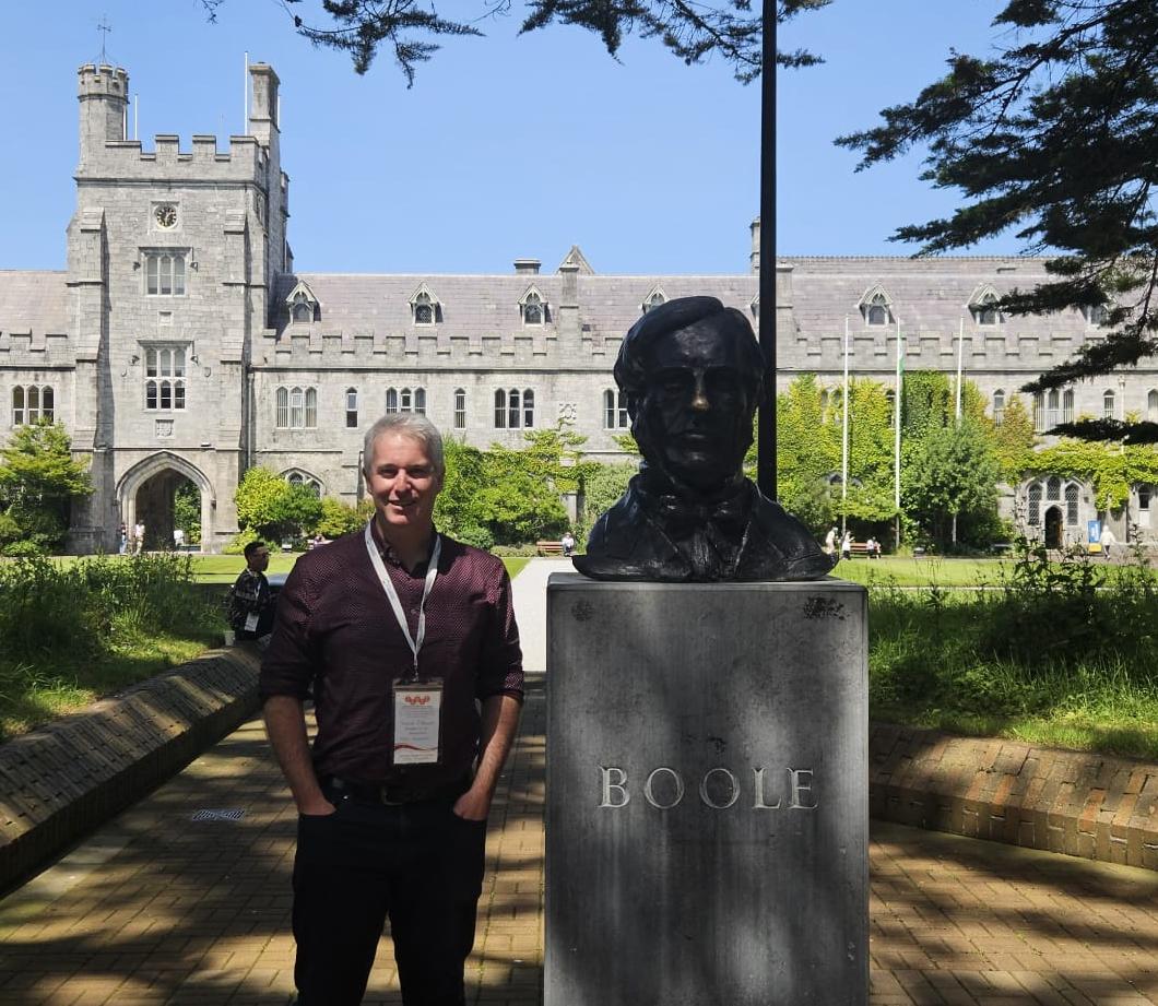 2026 Principal Tristan O'Hanlon Outside University College Cork with George Boole